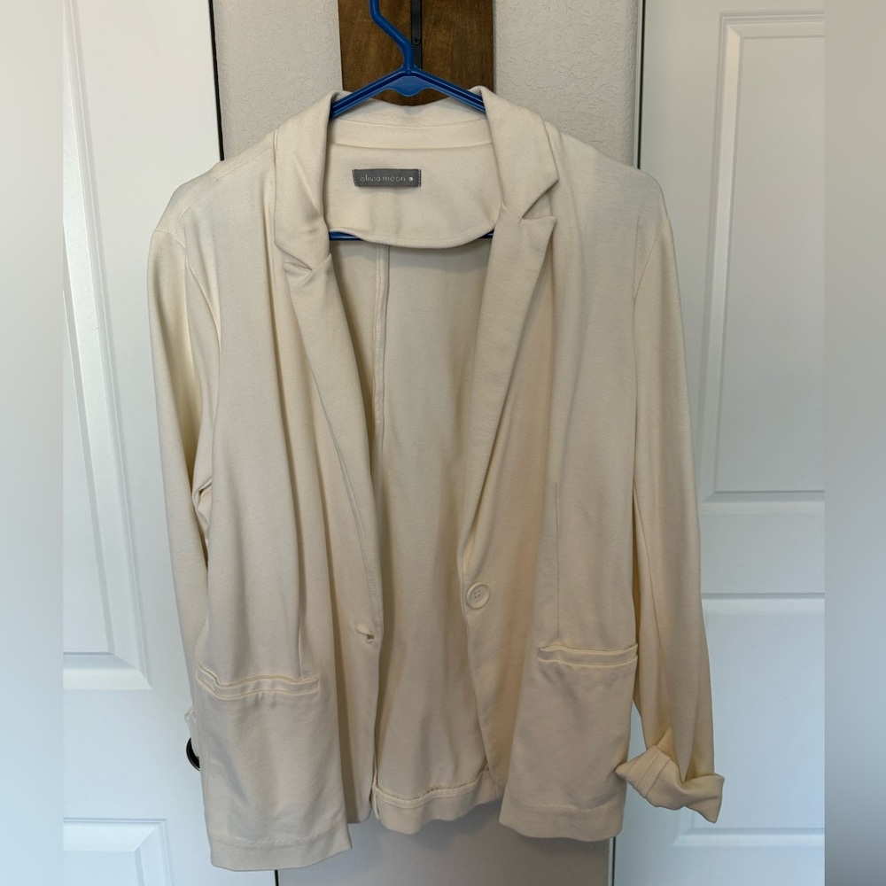 Cream color, blazer. Great for summer..